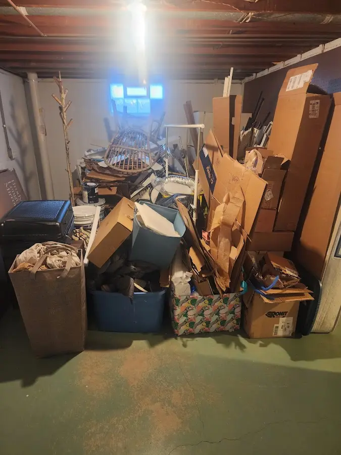 Roll-off dumpster container at job site for Construction Dumpster Rental in Medina